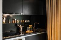 Le Petit Chalet - Artegianaleにあるキッチンまたは簡易キッチン