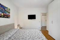 Posteľ alebo postele v izbe v ubytovaní Ninfea apartments