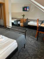 Postel nebo postele na pokoji v ubytování Hotel Boston