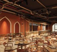 En restaurant eller et andet spisested på Mandala Cham Bay Paradise Hotel & Resort