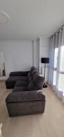 A seating area at Apartamentos Gran Socaire de Noja
