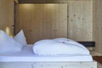 Łóżko lub łóżka w pokoju w obiekcie Hotel Obermoosburg