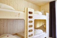 Łóżko lub łóżka w pokoju w obiekcie Hotel Obermoosburg