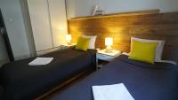 Posteľ alebo postele v izbe v ubytovaní Apartament Akali Centrum -Parking