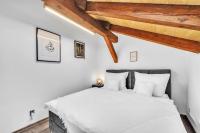 Postel nebo postele na pokoji v ubytování Hotel U Krále Jiřího