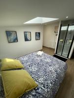 Cama ou camas em um quarto em R&eacute;sidence Tamaris Loft House