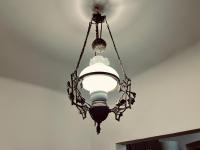 a chandelier hanging from a ceiling at Zentrum Vintage Appartments in Braşov