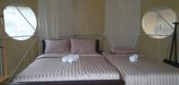 Postel nebo postele na pokoji v ubytování Lunda Orchid Resort