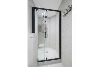 a shower with a glass door in a bathroom at 11.Appart 4pers#1 Bedroom#Pigalle#Opéra#Paris 9 in Paris