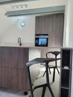 TV a/nebo společenská místnost v ubytování LIPNO BEACH SIDE - RIVIERA APARTMENT