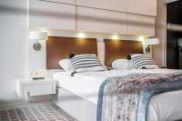 Posteľ alebo postele v izbe v ubytovaní Apartamenty Almar Marine