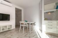 Televízia a/alebo spoločenská miestnosť v ubytovaní Apartment BEACH & RELAX