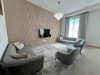 TV a/nebo společenská místnost v ubytování Luxury Villas with Beach Access by VB Homes