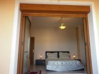 A bed or beds in a room at Zante View Studios & Villas