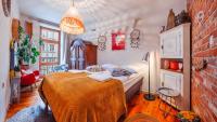 Łóżko lub łóżka w pokoju w obiekcie Apartamenty Sun & Snow Old Town Gdańsk