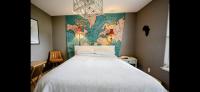 Family Friendly Home in walking district, 5 minutes from beachにあるベッド