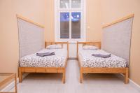 Posteľ alebo postele v izbe v ubytovaní Erzsebet19 Apartment