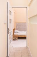 Posteľ alebo postele v izbe v ubytovaní Erzsebet19 Apartment