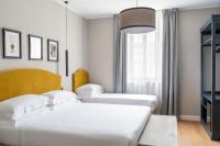 Flom Boutique Hotelにあるベッド