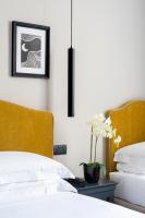 Flom Boutique Hotelにあるベッド