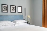 Flom Boutique Hotelにあるベッド