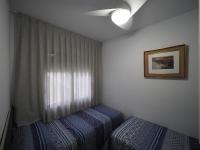 Postel nebo postele na pokoji v ubytování InmoSantos Oasis A1