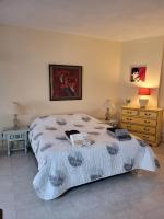 Łóżko lub łóżka w pokoju w obiekcie Charmante villa avec grande piscine au calme