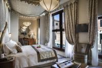 a bedroom with a large bed and a window at Ai Mori d&#39;Oriente in Venice
