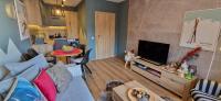 TV a/nebo společenská místnost v ubytování PinePino Borovets, aparthotel Borovets Gardens A60