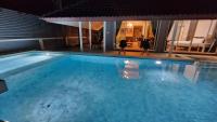 Bazén v ubytování I am pool villa Pattaya no 5 nebo v jeho okolí
