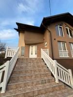 a house with stairs in front of it at VILLA M Slatina Banja Luka 