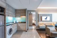 Kuchyň nebo kuchyňský kout v ubytování Adelphi Suites Bangkok