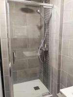 a shower with a glass door in a bathroom at 4PA72 - Magnifique appartement pour 4 dans résidence avec piscine et parking in Collioure