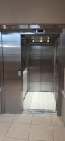 an elevator in a building with a glass door at Disney best location &amp; confortable 4 beds - All by feet in Serris