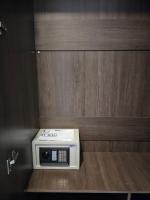 a microwave sitting on the floor in a room at Samui Green Hotel in Chaweng
