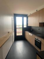 Kuchy&#x148;a alebo kuchynka v ubytovan&iacute; Appartement haut de gamme - Centre Ville