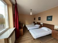 Motel Pieprzykにあるベッド