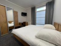 Motel Pieprzykにあるベッド