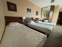 Motel Pieprzykにあるベッド