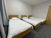 Motel Pieprzykにあるベッド