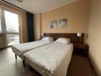 Motel Pieprzykにあるベッド