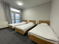 Motel Pieprzykにあるベッド