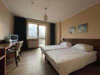Motel Pieprzykにあるベッド