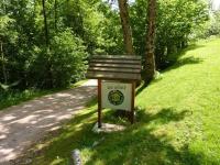 a sign sitting on the side of a road at Gîte Le Menil, 5 pièces, 5 personnes - FR-1-589-107 in Le Ménil