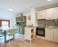 A kitchen or kitchenette at Square Apartment
