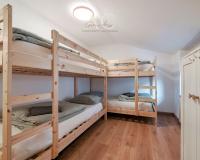 A bed or beds in a room at Square Apartment