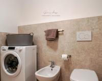 A bathroom at Square Apartment