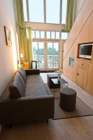 TV a/nebo společenská místnost v ubytování Hotel AM MEER & Spa
