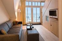 TV a/nebo společenská místnost v ubytování Hotel AM MEER & Spa