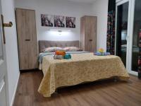 Postel nebo postele na pokoji v ubytování Holiday House Gloria Srima